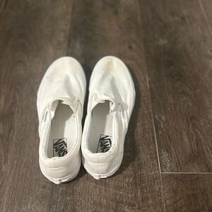 White slip on Vans